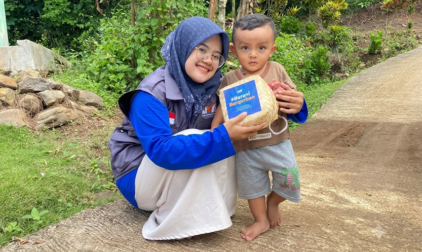 Woman holding donation box